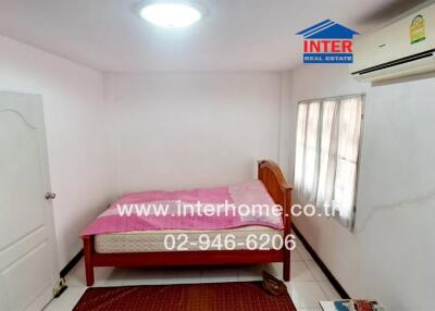 Bright and compact bedroom with air conditioning