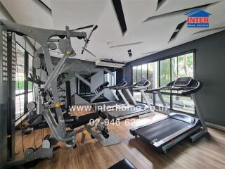 Modern home gym with various exercise equipment