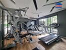 Modern home gym with various exercise equipment