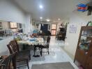 Cluttered kitchen and dining area in a residential home