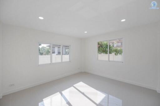 Spacious and bright living room with large windows