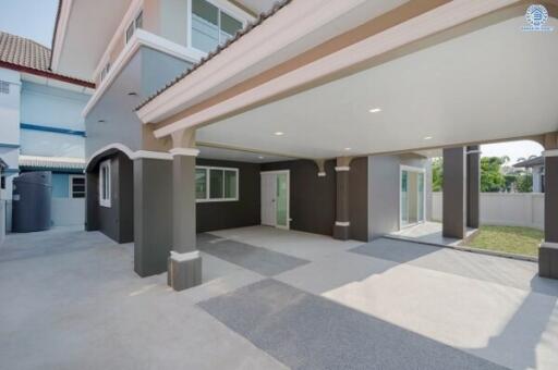 Spacious covered carport area of a modern residential home