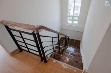 Modern staircase in newly constructed home