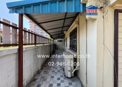 Covered outdoor walkway in a residential building