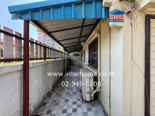Covered outdoor walkway in a residential building