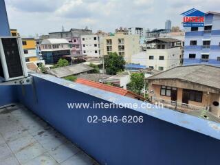 City view from residential building balcony