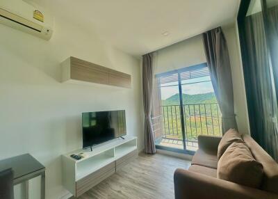 Bright and modern living room with balcony access