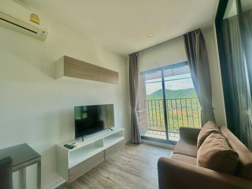 Bright and modern living room with balcony access