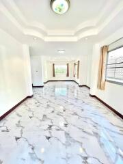 Bright and spacious hallway with marble flooring