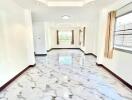 Bright and spacious hallway with marble flooring