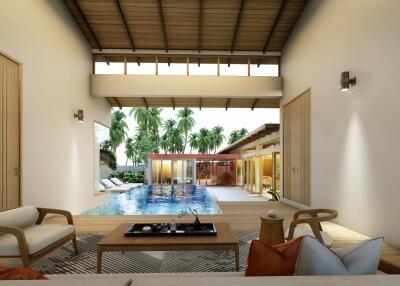 Spacious and modern indoor living area with a view of the pool and lush garden