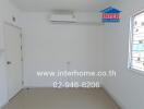 Spacious and bright empty bedroom with air conditioning