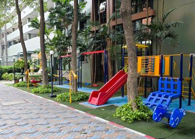 Colorful outdoor playground in residential apartment complex