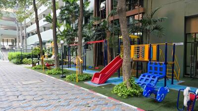 Colorful outdoor playground in residential apartment complex