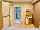 Compact bedroom with attached kitchenette