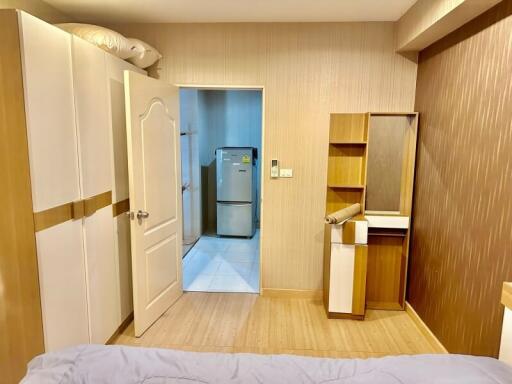 Compact bedroom with attached kitchenette