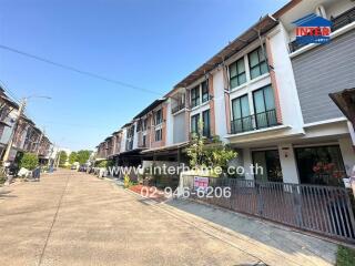 Exterior view of a modern townhouse complex