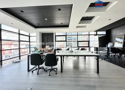 Modern office space with panoramic windows and contemporary furnishings