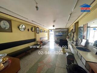 Spacious and brightly lit living room with traditional decor