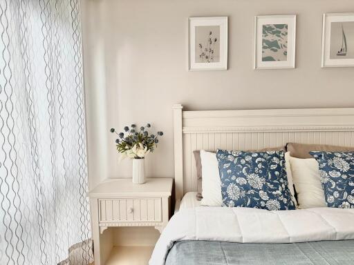 Elegant bedroom interior with white and blue color scheme