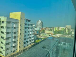 Cityscape view from apartment building window