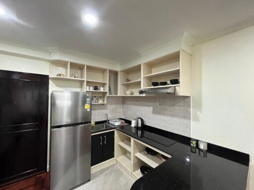 Modern kitchen with stainless steel appliances and ample cabinetry