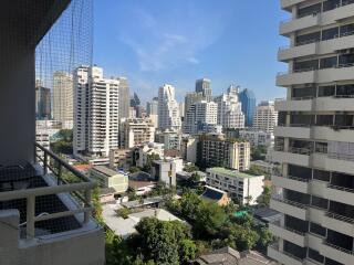 Panoramic city view from high-rise balcony