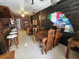 Rustic styled restaurant interior with wooden furniture and decorative elements
