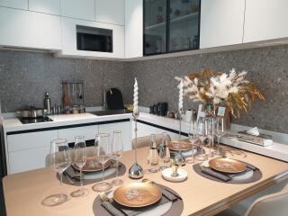 Modern kitchen with a beautifully set dining area