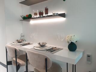 Modern kitchen dining area with elegant table setting