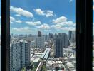 Panoramic city view from a high-rise apartment window