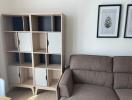 Modern living room with stylish sofa and elegant shelving unit