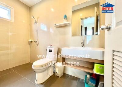 Modern bathroom with sleek design and essential amenities