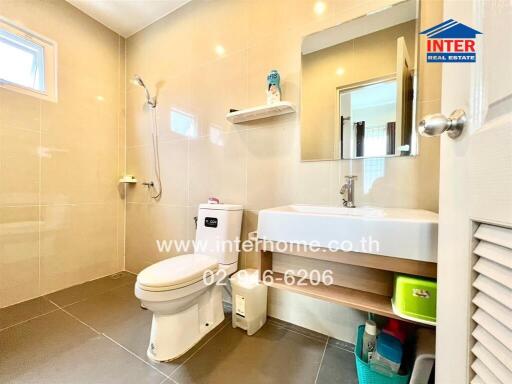 Modern bathroom with sleek design and essential amenities