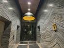 Elegant lobby with distinctive marble walls and stylish lighting