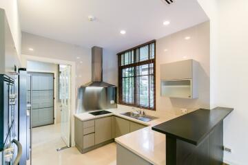 Modern spacious kitchen with stainless steel appliances