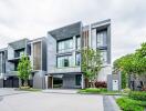 Modern urban townhouses with lush landscaping and contemporary design