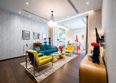 Modern living room with vibrant furniture and elegant decor