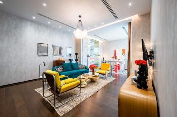 Modern living room with vibrant furniture and elegant decor