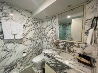 Luxurious marbled bathroom with modern fixtures