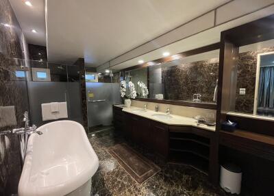 Luxurious bathroom with marble finishes and modern fixtures