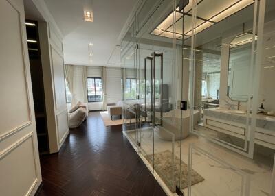 Spacious and modern living room with glass partition