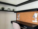 Modern home office with elegant chair and corkboard
