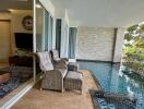 Spacious balcony with seating area and private pool