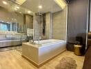 Modern bathroom with freestanding bathtub and glass shower area