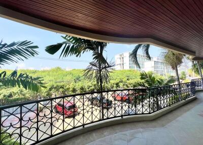 Spacious balcony with scenic view and modern railings