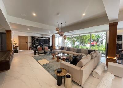 Spacious and modern living room with bright natural lighting