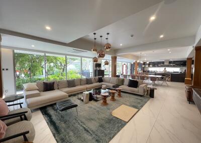 Spacious living room with modern furniture and open plan layout