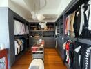 Spacious walk-in closet with ample storage and elegant design