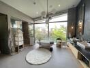 Spacious modern bathroom with freestanding tub and large windows